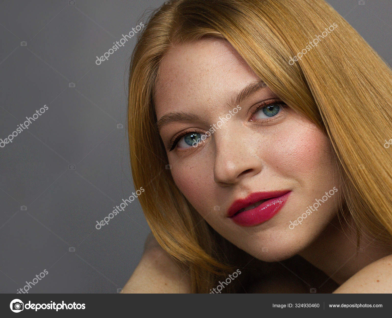 Close-up beauty of a redhead beauty with freckles and long hair - Main Image