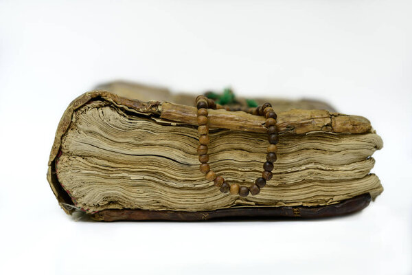 Antique old books isolated on white background. Selective focus.