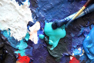 Art palette and paintbrushes