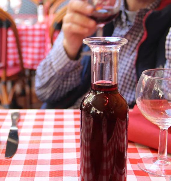 Home wine in the jar in French restaurant — Stock Photo, Image