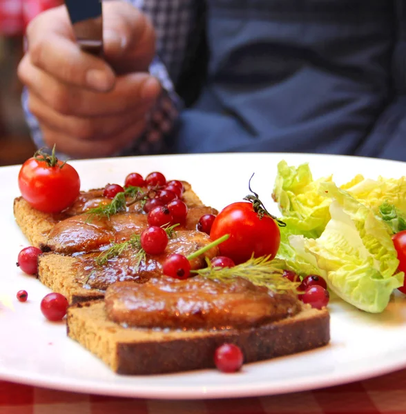 Man eating Foie gras in French restaurant — Stock Photo, Image