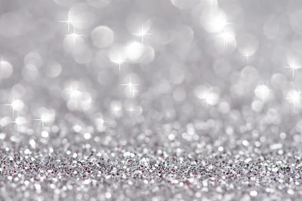 Silver glittering christmas lights. Blurred abstract background — Stock Photo, Image