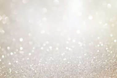 Gümüş pırıltılı Noel ışıkları. Bulanık arka plan