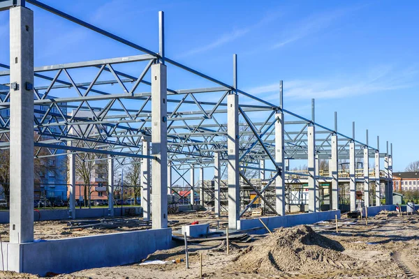 The steel frame of a new factory building under construction