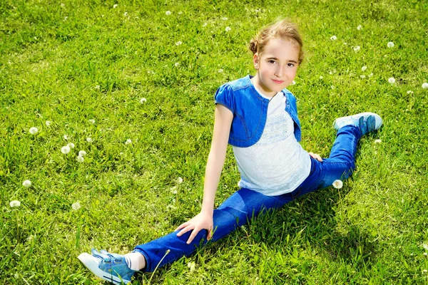 girl sits on twine