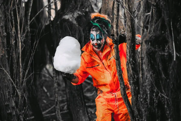 clown with candy-floss