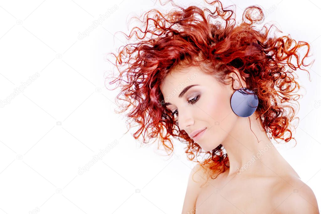 voluminous curly red hair