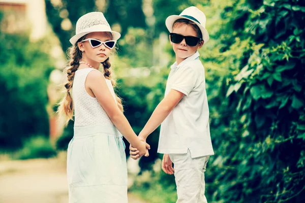 Best Friends Cute Children Girl And Boy Walk In The Park On A Summer Day Kid S Fashion Stock Images Page Everypixel Best Friends Cute Children Girl And Boy Walk In The Park On A Summer Day Kid S Fashion Stock Images Page Everypixel