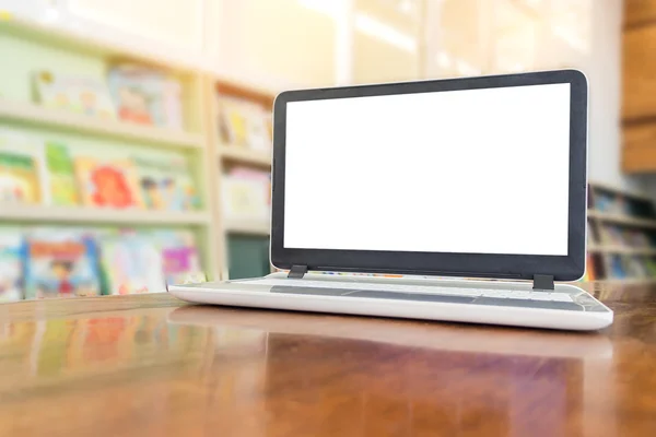 Laptop with copy space white window on wooden table against boke — Stock Photo, Image