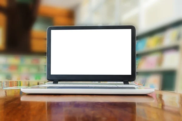 Laptop with copy space white window on wooden table against boke — Stock Photo, Image