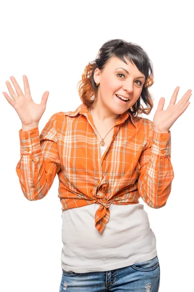 Portrait of an enthusiastic girl in orange shirt and jeans on wh — Stock Photo, Image