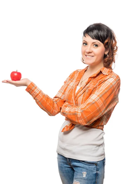 Happy girl holding a red apple on a white background — Stock fotografie