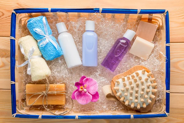 Hygiene products and accessories in a straw basket top view Stock Image