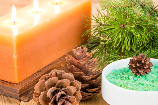 Cones and branches of fir in the composition of sea salt and can — Stock Photo, Image