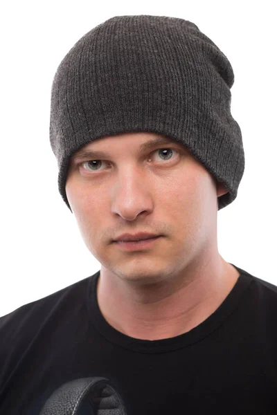 Fashionable young man in a gray cap on a white background — Stock Photo, Image