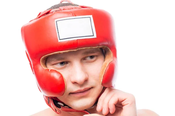 一个年轻人在拳击头盔，脸部特写 — 图库照片