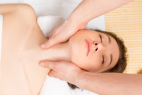 Male hands on a female professional masseur neck and shoulders c — Stock Photo, Image