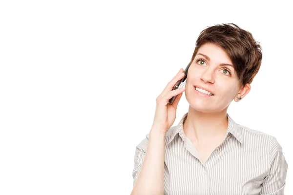 Happy woman with mobile phone and space left — Stock Photo, Image