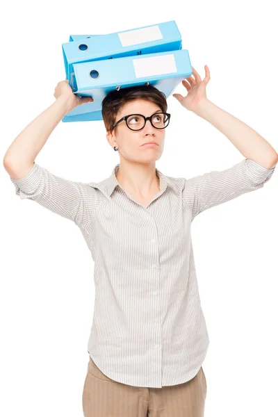 Businesswoman with folders on her head holding a balance on a wh — Stock Photo, Image