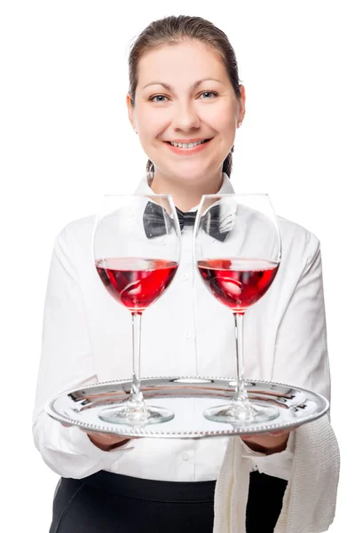 The waitress gives a delicious red wine, portrait on a white bac Royalty Free Stock Images