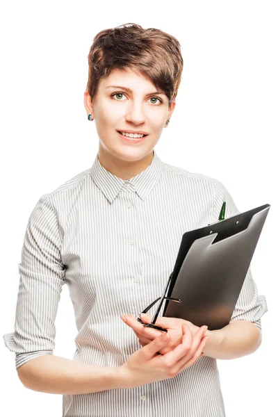 Young and beautiful businesswoman with a folder in hands on a wh — Stock Photo, Image