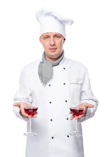 Chef holds two glass of red wine on a white background — Stock Photo, Image