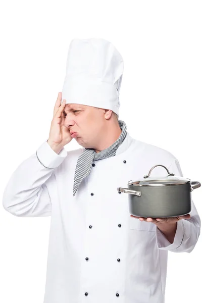 Emotional upset unsuccessful dish cook in a pot on a white backg — Stock Photo, Image