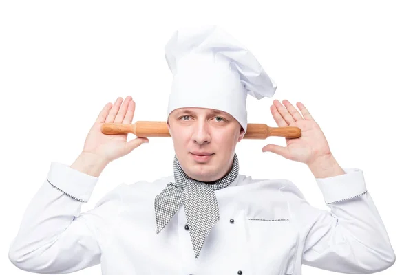 Humorous chef with a wooden rolling pin on a white background — Stock Photo, Image