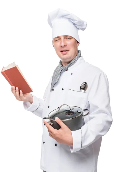 Jonge chef-kok studeren soep recept portret geïsoleerd — Stockfoto