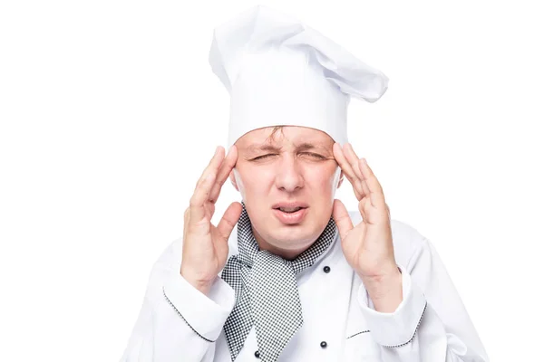 Szakács van egy migrén, érzelmi portré egy fehér háttér — Stock Fotó