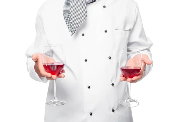 Handen houden van wijnglazen op de voorkant van de borst iso koken — Stockfoto