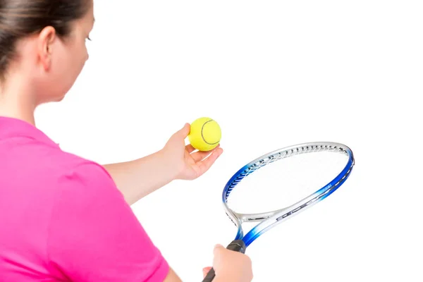 Ball and racket in the hands of women, the view from behind on a — Stock Photo, Image