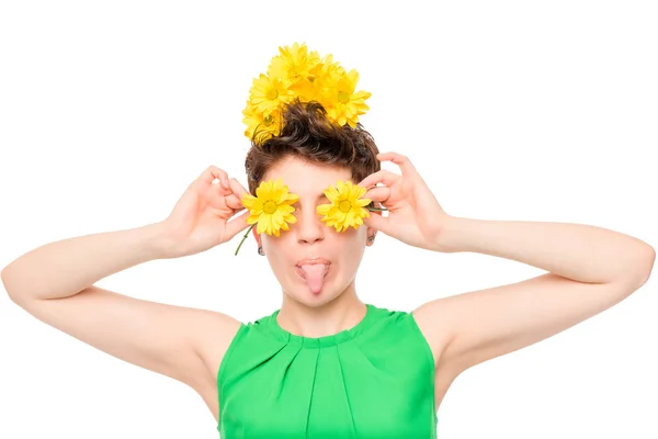 Horizontal portrait fun naughty girl with flowers in studio — Stock Photo, Image