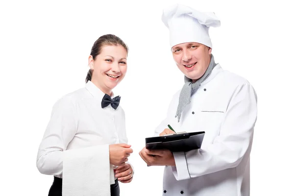 Chef with a folder and a waiter with a towel smiling on a white — Stock Photo, Image