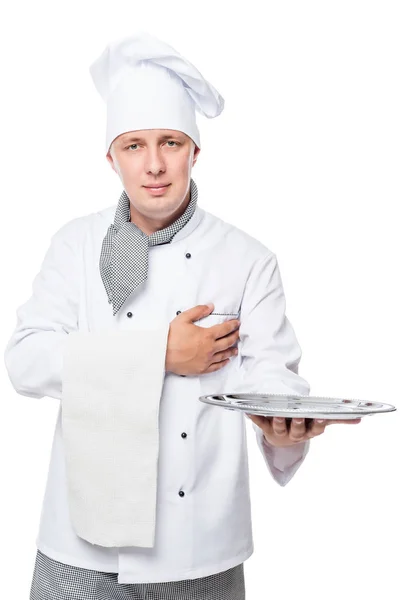 Vriendelijke chef-kok met een dienblad op zijn hand poseren op een witte CHTERGRO — Stockfoto