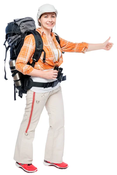 Turista en camisa a cuadros con una mochila sobre un fondo blanco — Foto de Stock