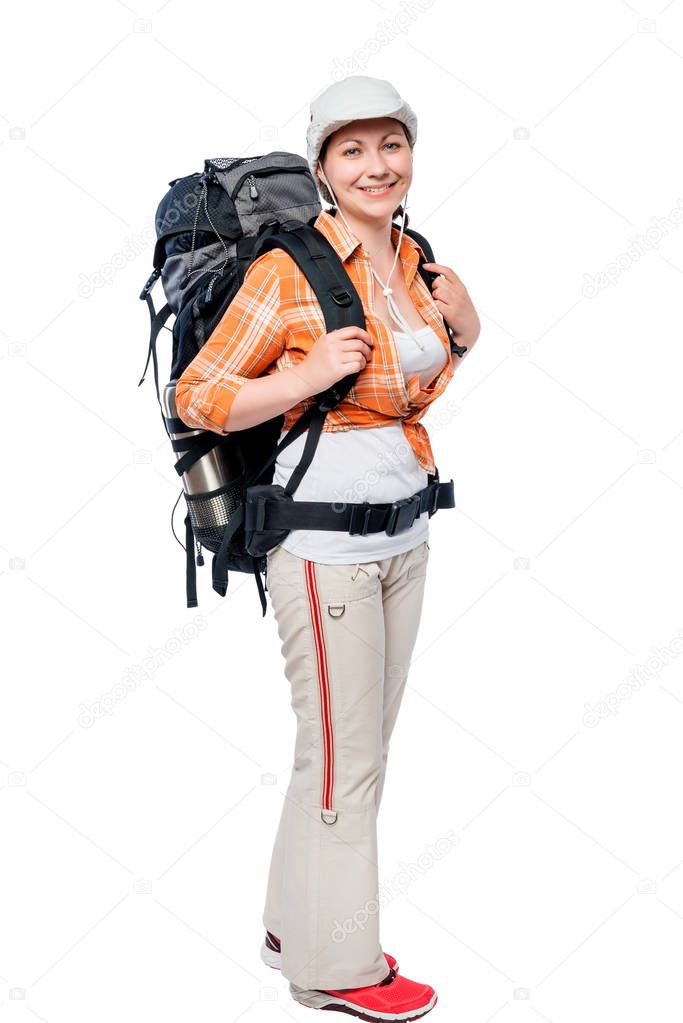 young girl tourist with a big backpack in full length on white b