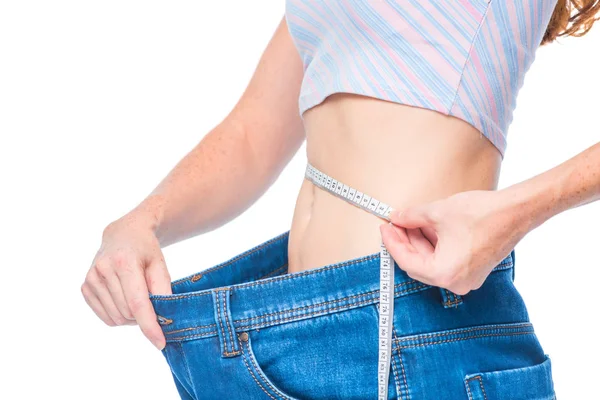 Measurement of the waist after weight loss, stomach close-up — Stock Photo, Image