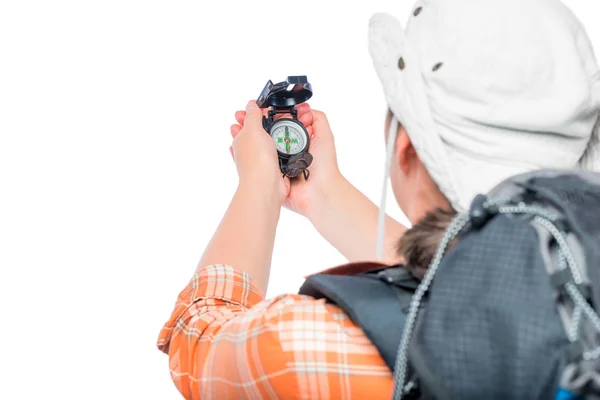 Tourist with a backpack checks the direction of movement on the — Stock Photo, Image
