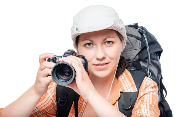 Woman with a professional camera in the campaign against a white — Stock Photo, Image