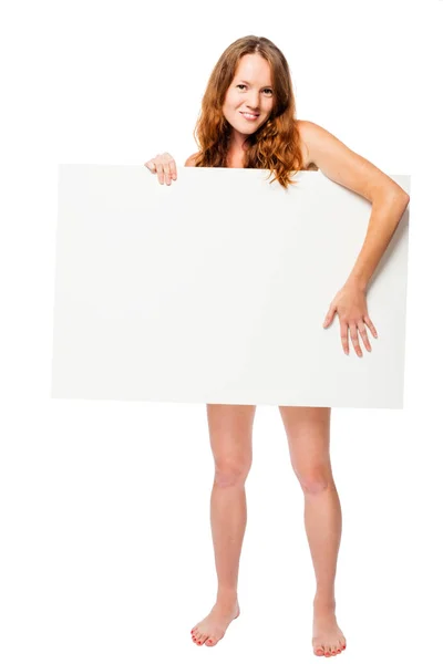 Hermosa chica en longitud completa con un cartel que cubre la desnudez — Foto de Stock