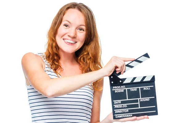 Κορίτσι με ένα χαμόγελο κρατώντας μια κλακέτα ταινία λευκό λεμονάτα — Φωτογραφία Αρχείου