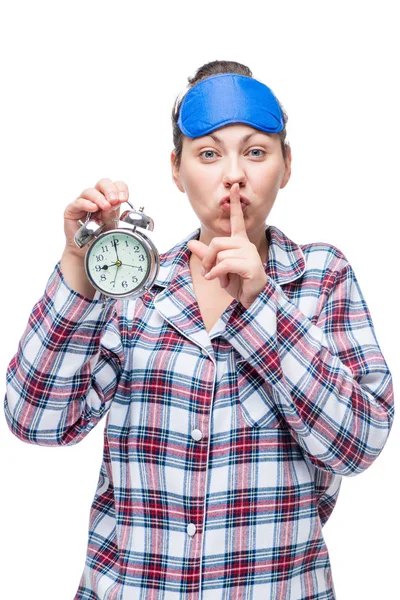 Mujer caucásica muestra gesto de dedo en silencio y muestra el tiempo en un — Foto de Stock