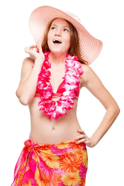Beautiful model in floral lei and hat on a white background — Stock Photo, Image