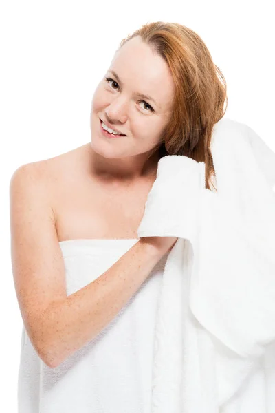 Happy young woman drying towel, red hair on white background — Stock Photo, Image