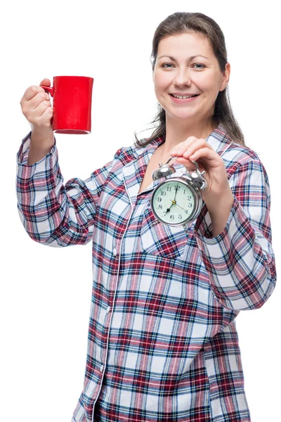 Vertikální portrét ženy v pyžamu s šálkem čaje s — Stock fotografie