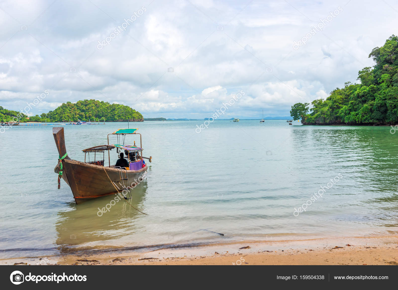 View of Thai wooden boat and scenic landscape, Thailand ...