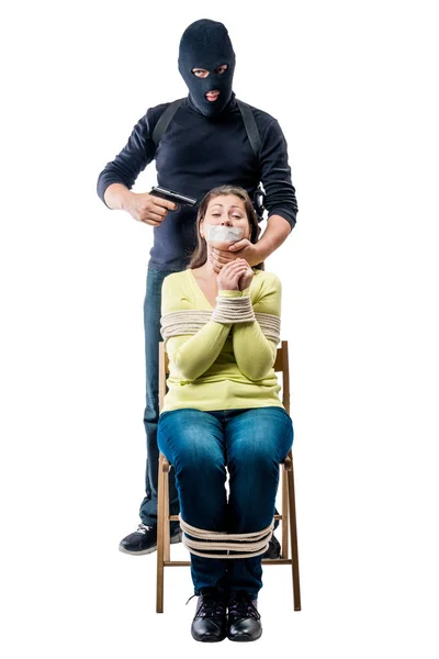 Terrorist in mask with arms and bound hostage on white backgroun — Stock Photo, Image