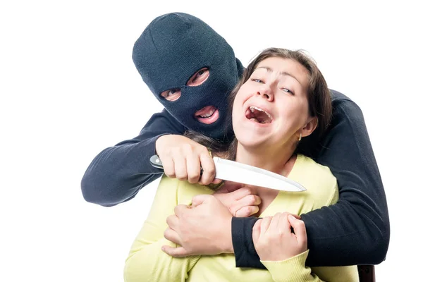 A terrorist in a balaclava threatens a victim with a knife again — Stock Photo, Image