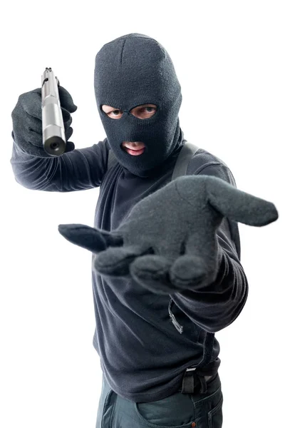 Armed robber requires money and aims at the camera — Stock Photo, Image